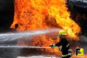 آتش سوزی تریلی در محور بندر امام خمینی